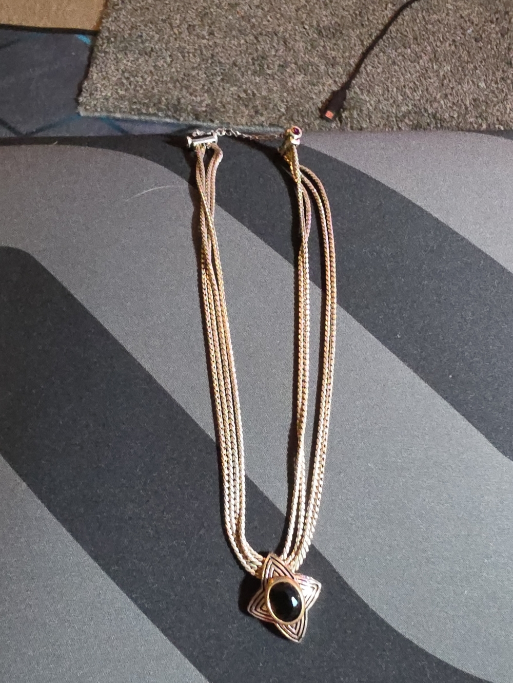 Multi-Strand Silver Tone Necklace with Black Stone Star Pendant